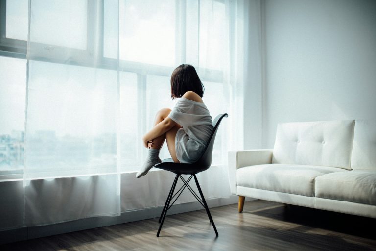 Woman sitting on chair